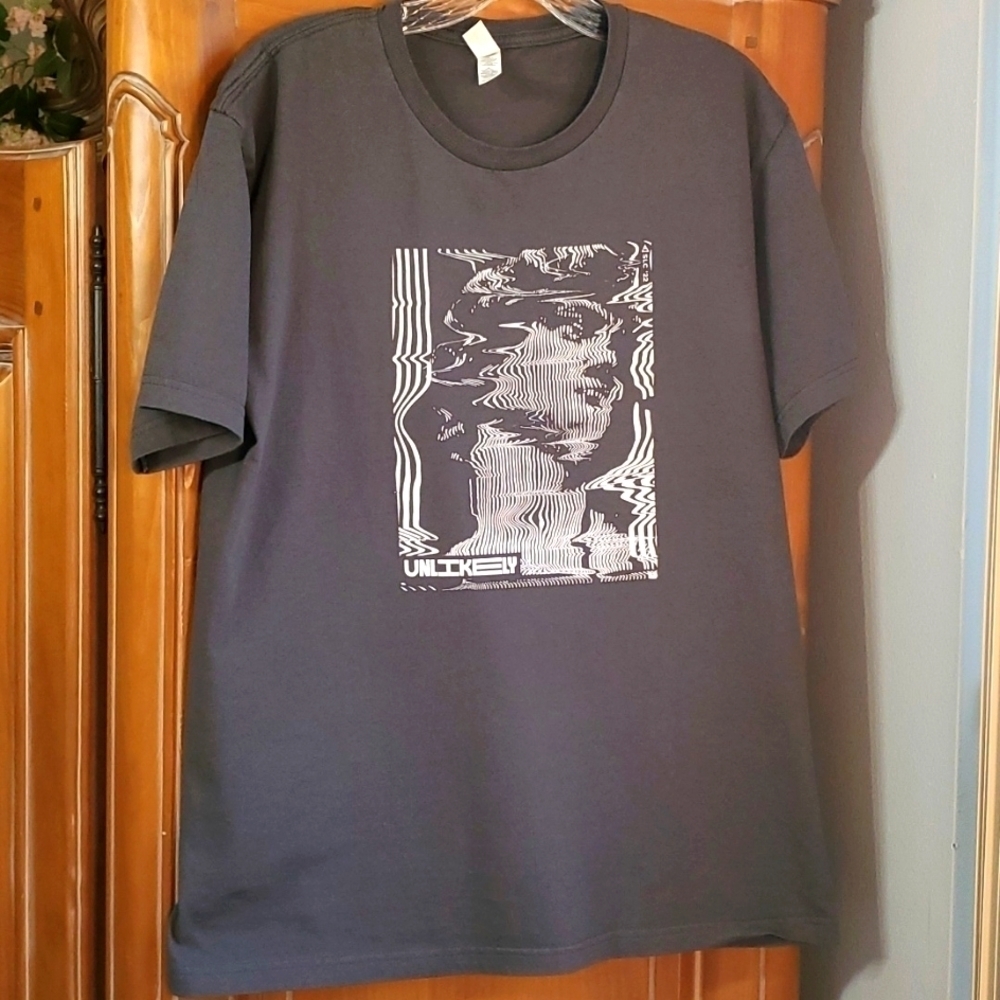 UNLIKLEY Mens gray tee, size medium. Abstract of David. By next level Good cond